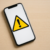 Alerte de prudence sur smartphone